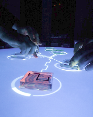 Illustration for article titled ReacTable Synth Makes Touchy-Feely Music for your Eyes